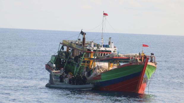 Australian Border Force boarding an Indonesian fishing vessel suspected of illegal fishing