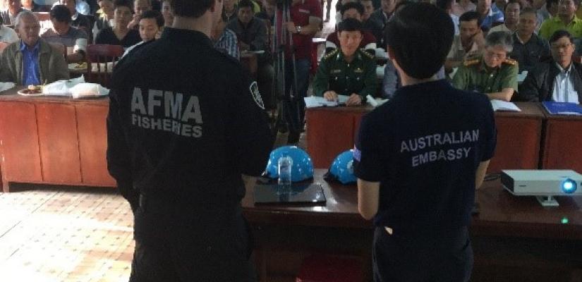 An AFMA officer with Embassy translator involved in a public information campaign in Vietnam. Source: AFMA.
