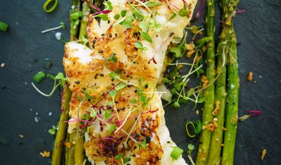Patagonian toothfish or Chilean seabass baked with asparagus