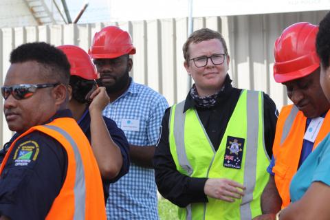 Image of Fisheries Officer Lydia with students in the Pacific.