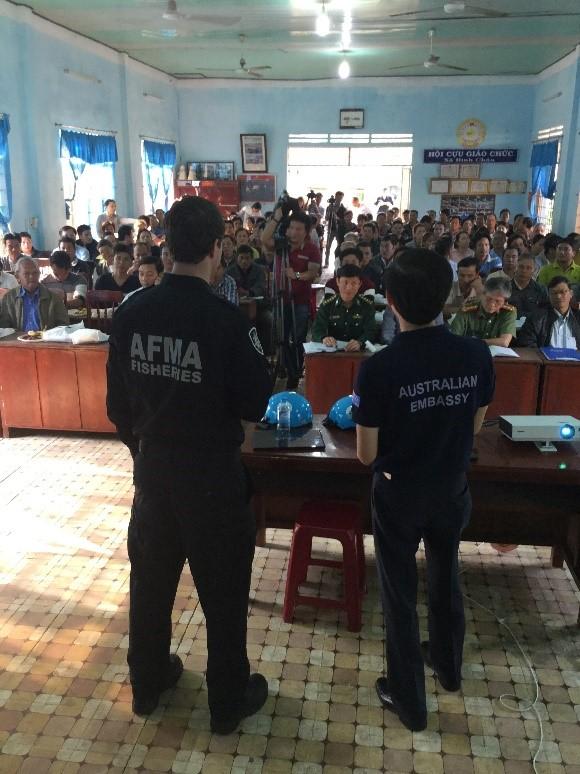 An AFMA officer with Embassy translator involved in a public information campaign in Vietnam. Source: AFMA.